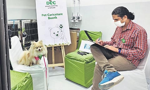 Marshmallow at the pet caricature booth.