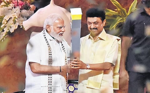 Prime Minister Narendra Modi and Chief Minister MK Stalin with the olympiad torch at the inauguration of the 44th Chess Olympiad on Thursday. (Photo | P Jawahar/EPS)