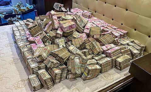 Cash recovered by ED officials from the residence of Arpita Mukherjee, a close aide of West Bengal Minister Partha Chatterjee. (Photo | PTI)