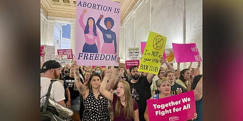 Abortion rights protesters chant outside of the West Virginia Senate chambers prior to a vote on an abortion bill on Friday. (Photo |AP)