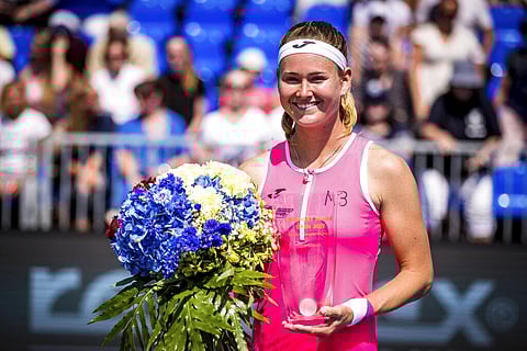 Marie Bouzkova holds the trophy after winning the final match against Russia's Anastasia Potapova at the Livesport Prague Open tennis tournament. (Photo | AP)