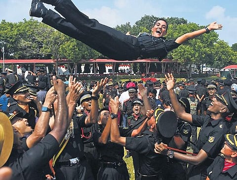 New graduates celebrate at the Officers Training Academy on Saturday | Ashwin Prasath