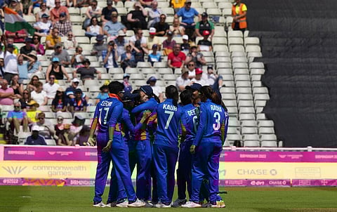 Indian cricketers celebrate after dismissing Australia's Tahlia McGrath during the women's cricket T20 preliminary round match between India and Australia. (Photo | AP)