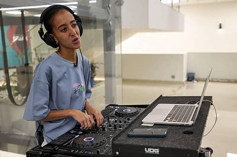 Saudi DJ Leen Naif plays at a university event in Saudia Arabia's Red Sea coastal city of Jeddah on May 26, 2022. (Photo | AFP)