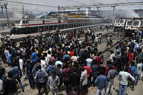 Protest against the Central government’s Agnipath Scheme turns violent as protestors set train bogies on fire at Secunderabad Railway Station. (Photo | Vinay Madapu/EPS)