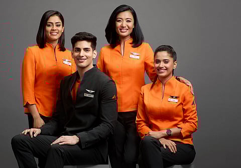 Akasa Air unveiled the uniform for its crew on Monday. (Photo | EPS)