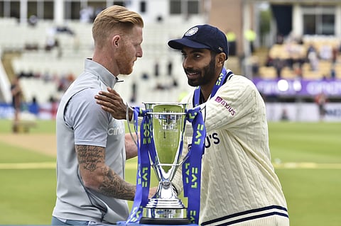 England's captain Ben Stokes, left, and India's captain Jasprit Bumrah shake hands after receiving the winners trophy at Edgbaston in Birmingham, England. (Photo | PTI)