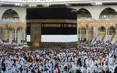Thousands of Muslim pilgrims circumambulate around the Kaaba, the cubic building at the Grand Mosque, in the Saudi Arabia's holy city of Mecca. (Photo | AP)