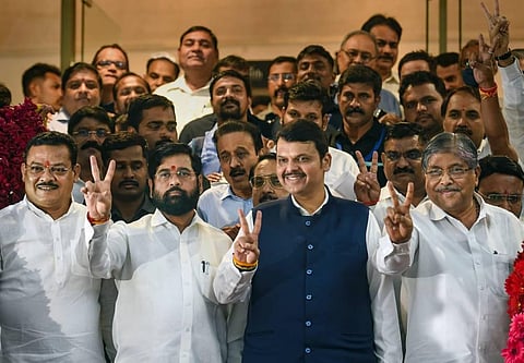 Maharashtra CM Eknath Shinde and Maharashtra Deputy Chief Minister Devendra Fadnavis along with MLAs after a special session of Maharashtra Assembly. (Photo | PTI)