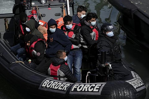 People thought to be migrants who undertook the crossing from France in small boats and were picked up in the Channel. (Photo | AP)