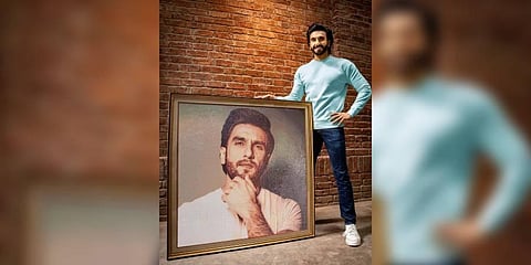 Ranveer Singh poses with his birthday gift, a portrait of Ranveer bedazzled with 100,000 crystals. (Photo | Instagram)