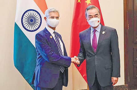 External Affairs Minister S Jaishankar with his Chinese counterparty Wang Yi ahead of the G20 Foreign Ministers’ Meeting in Bali, Indonesia, on Thursday | PTI