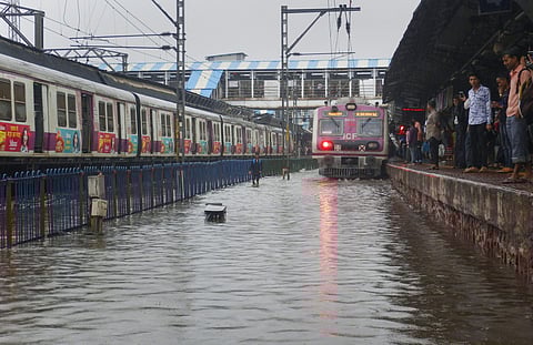 A view of waterlogged railway tracks following heavy rains in Thane. (File Photo | PTI)