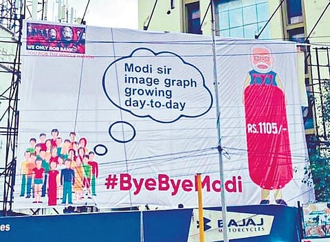 A flexi erected against the LPG price hike up in Hyderabad on Thursday