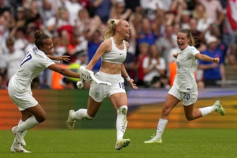 England's Chloe Kelly takes off her shirt celebrating after scoring her side's second goal during the Women's Euro 2022 final soccer match between England and Germany. (Photo | AP)