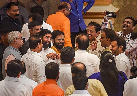 Maharashtra Chief Minister Eknath Shinde with Leader of Opposition Ajit Pawar and others during the swearing-in ceremony of new ministers, at Raj Bhavan in Mumbai, on August 9, 2022. (Photo | PTI)