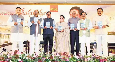 Prof Acharya N Gopi releases MD HMRL NVS Reddy’s poetry book titled ‘Megapatham’ in Hyderabad on Tuesday