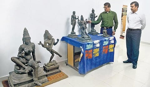 Idol Wing CID DGP Jayanth Murali and IG Dinakaran inspect the seized idols in Chennai on Wednesday | Martin Louis