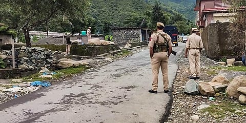 Security personnel guard near the encounter site after a suicide attack bid at an Army camp in Darhal area of Rajouri. (Photo | PTI)
