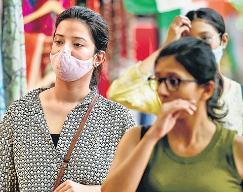 In February, the fine amount on violation of the mask rule was slashed from Rs 2,000 to Rs 500. The penalty was lifted on March 31 as cases had been on the downslide. (Photo | PTI)