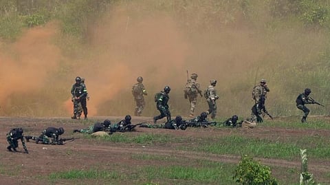 US and Indonesian soldiers take their positions during Super Garuda Shield 2022 joint military exercises in Baturaja, South Sumatra, Indonesia. (Photo | AP)