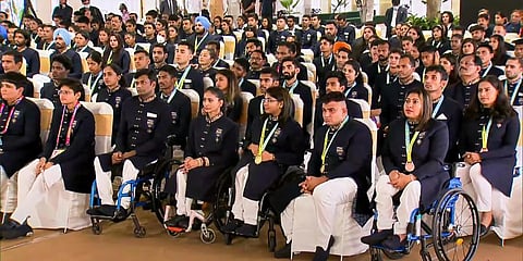 Members of the Indian contingent for the Commonwealth Games 2022 during their interaction with Prime Minister Narendra Modi.(Photo | PTI)