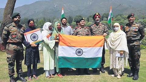 Army Commander Lt Gen Upendra Dwivedi, and Chinar Corps Commander Lt Gen ADS Aujla with the local residents of Keran | express