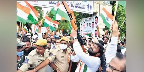 Sports Minister V Srinivas Goud fires in the air ‘to start off’ the Freedom Rally in Mahabubnagar town on Saturday