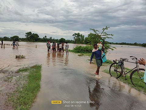 Balichada village under Kalampur block cut off due to flood waters of Hati river.