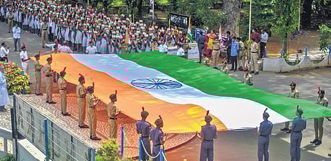 College students take part in a rally with a national flag as part of Azadi ka Amrit Mahotsav. (Photo | Prasant Madugula)