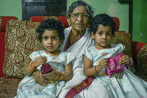 Rampilla Narasayamma (92) with her great-granddaughters. (Photo | Prasant Madugula)