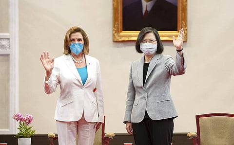 US House Speaker Nancy Pelosi, left, and Taiwanese President President Tsai Ing-wen wave during a meeting in Taipei, Taiwan on Aug. 3, 2022. (File Photo | AP)