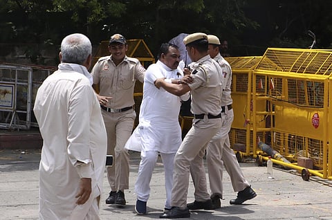 Aam Aadmi Party (AAP) leaders were detained after they gathered outside Manish Sisodia's residence today. (Photo | Shekhar Yadav, EPS)