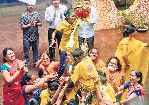 Students of Kamala Mehta School for Blind form a human pyramid to break the 'dahi handi' during Janmashtami festival celebrations, in Mumbai, Thursday. (Photo | PTI)