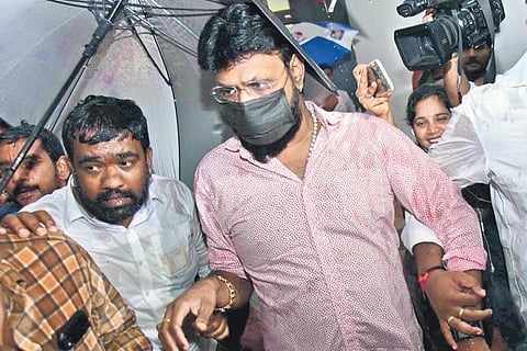 Chikoti Praveen Kumar heads to the Enforcement Directorate’s office at Nampally in Hyderabad on Monday