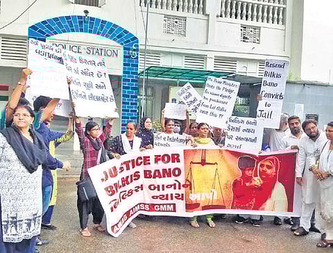 Social organisations hold a demonstration against release of convicts in Bilkis Bano’s gang-rape case in Ahmedabad on Friday. (Photo| Express)