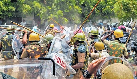 File photo of police personnel charging at protestors during the 2018 protest | PTI