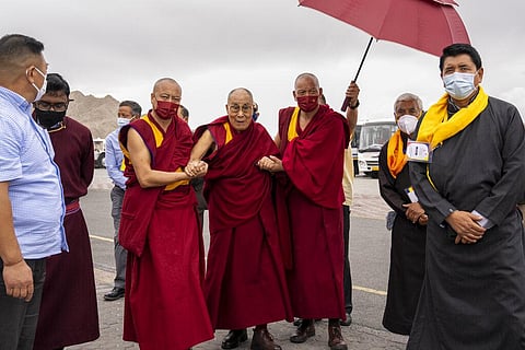 Tibetan spiritual leader the Dalai Lama arrives at the airport in Leh, Ladakh, India, Friday, July 15, 2022. (Photo | AP)