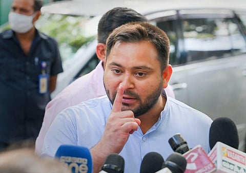 Bihar Deputy Chief Minister and RJD leader Tejashwi Yadav interacts with the media after a meeting with Congress interim President Sonia Gandhi, in New Delhi. (Photo | PTI)