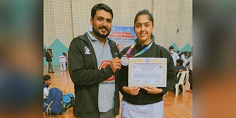 Ankita with her coach Shihan Keerti.
