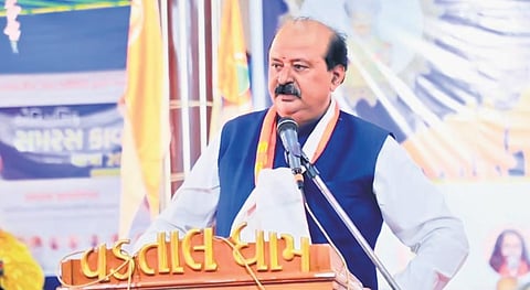 Gujarat leaders Purnesh Modi (above) and Rajendra Trivedi were stripped of the Road and Building, and Revenue portfolios, respectively, on Saturday