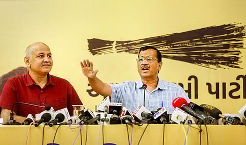 Delhi Chief Minister Arvind Kejriwal and Deputy Chief Minister Manish Sisodia address a press conference in Ahmedabad on August 22, 2022. (Photo | PTI)