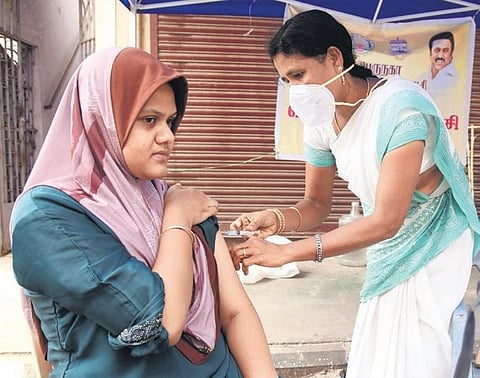 A woman gets the Covid-19 vaccine at Triplicane in Chennai on Sunday | R Satish Babu