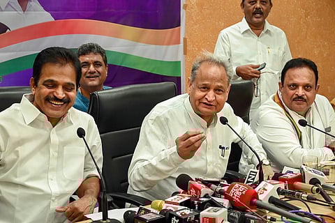 Rajasthan Chief Minister and senior Congress leader Ashok Gehlot (Centre) with AICC General Secretary KC Venugopal (Left) addresses a press conference, in Ahmedabad. (Photo | PTI)