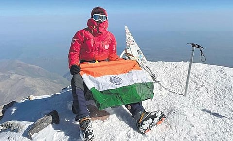 Yemula Nithin poses with the Indian flag after climbing Mt Elbrus, (18,510 ft) on Wednesday