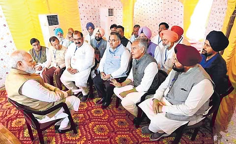 PM Narendra Modi interacts with Punjab leaders who have moved to BJP. (Photo | EPS)