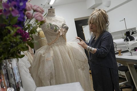 Elizabeth Emanuel, who designed Diana, Princess of Wales wedding dress, speaks at her studio. (Photo | AP)