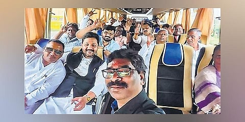 CM Hemant Soren along with UPA MLAs on a bus on Saturday. (Photo | PTI)