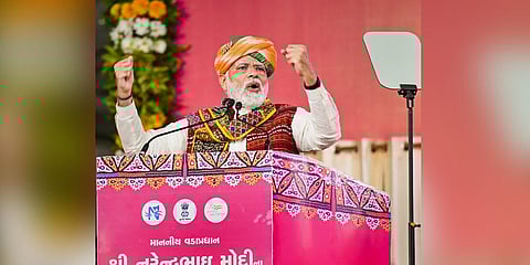 Prime Minister Narendra Modi addresses a public programme at Krantiveer Shyamji Krishnavarma-KSKV University Ground, in Bhuj.(Photo | PTI)