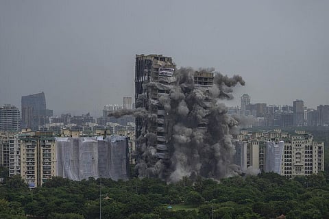 Explosives are detonated to demolish twin high-rise apartment towers in Noida, outskirts of New Delhi, India, Sunday, Aug. 28, 2022. (Photo | AP)